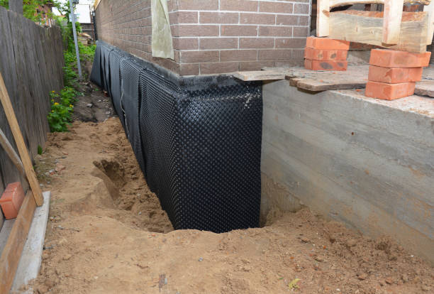 SJ Waterproofing Pros technician performing targeted Waterproofing assessment in Walton, KS